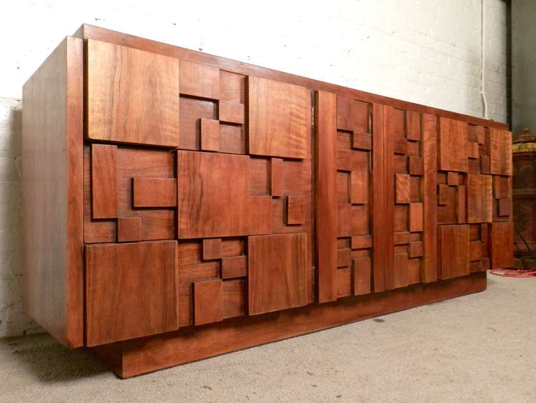Long dresser with outstanding mosaic relief front, inspired by the brutalist work of Paul Evans. Nine drawers give plenty of storage.

(Please confirm item location - NY or NJ - with dealer)