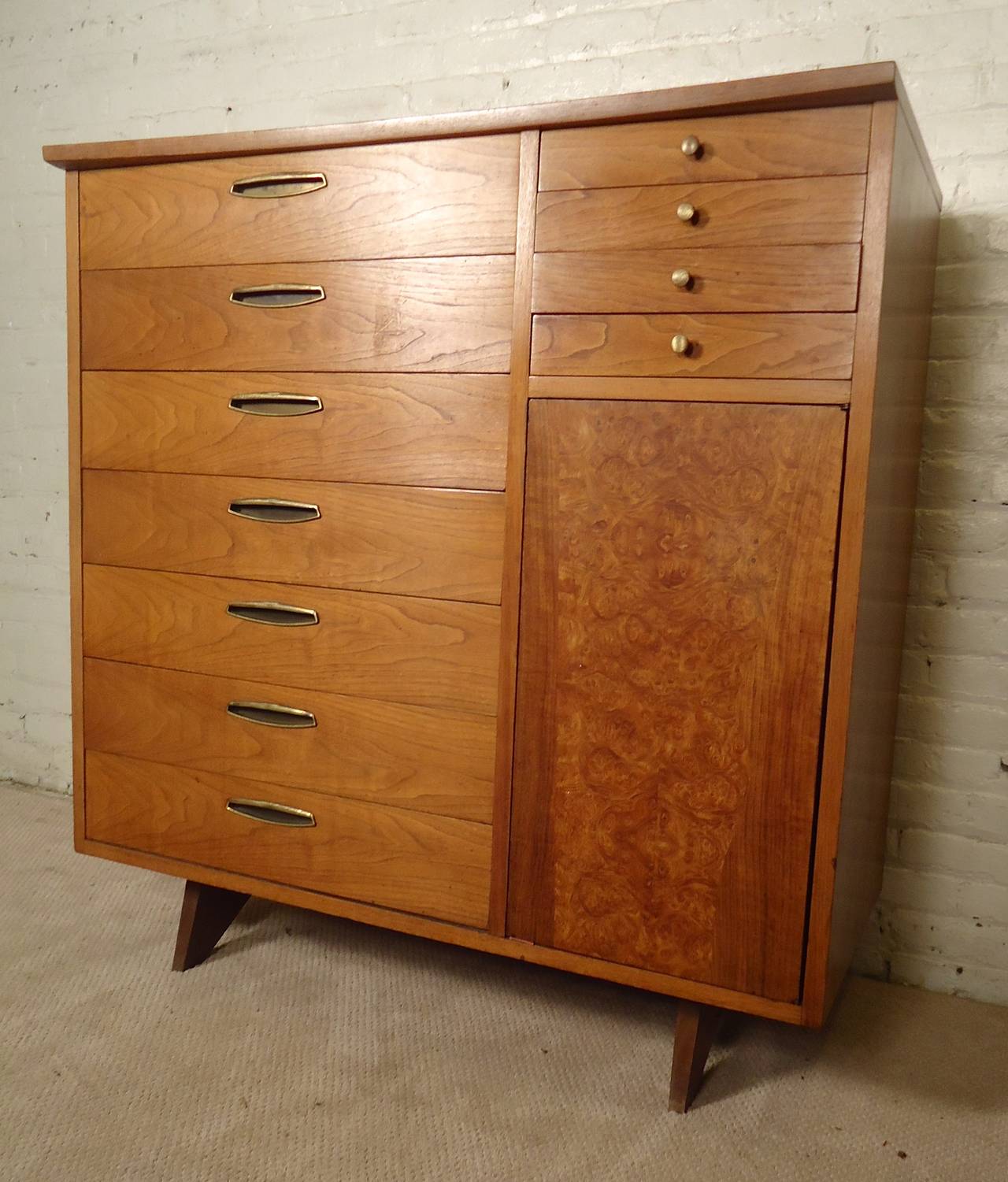 Beautiful Mid-Century Modern chest of drawers designed by George Nakashima for Widdicomb. Great design from the premier Mid-Century Furniture maker. Features include curved top, walnut grain, accenting brass hardware and gorgeous burlwood front