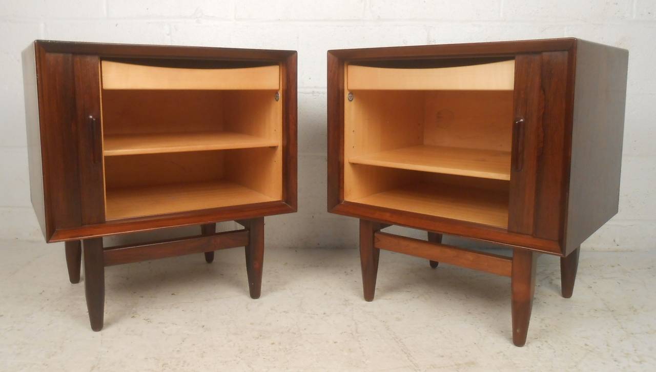 Elegant, well constructed, rosewood nightstands with tambour doors and beech drawers with adjustable shelf. Finished on all sides. Please confirm item location (NY or NJ) with dealer.