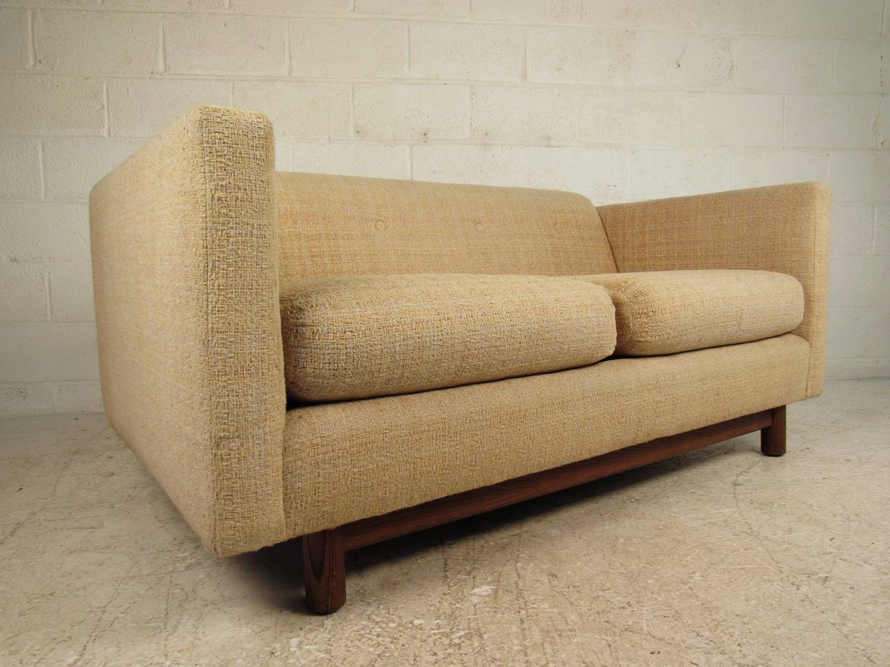This comfortable and stylish two-seat sofa makes a stylish vintage addition to any interior. Perfect seating for home or business, please confirm item location (NY or NJ).