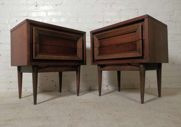Vintage modern nightstands by the Basic-Witz company out of Virginia. Modern lines, cone shape legs and frame design front that also acts as handles for each drawer.

(Please confirm item location - NY or NJ - with dealer)