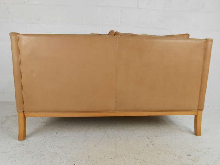 two seater brown leather sofa