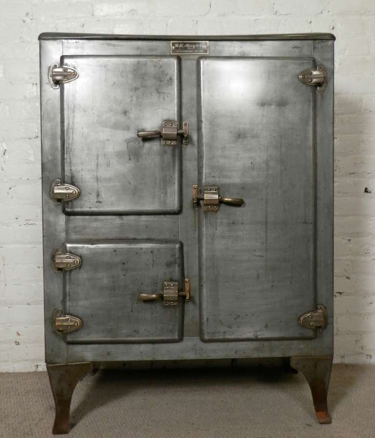 Outstanding metal ice chest newly restored to accommodate modern storage. Features three doors, brass hardware and original Macy's label. Makes great kitchen storage.

(Please confirm item location - NY or NJ - with dealer)