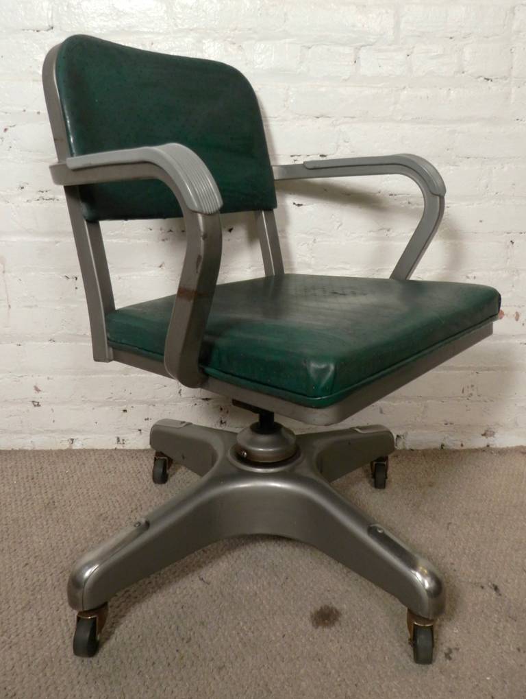 Vintage desk chair by American company Metal-Lux, with original vinyl seating. 360 degree casters, adjustable chair, heavy duty metal frame. These chairs were built to last. 

(Please confirm item location - NY or NJ - with dealer)