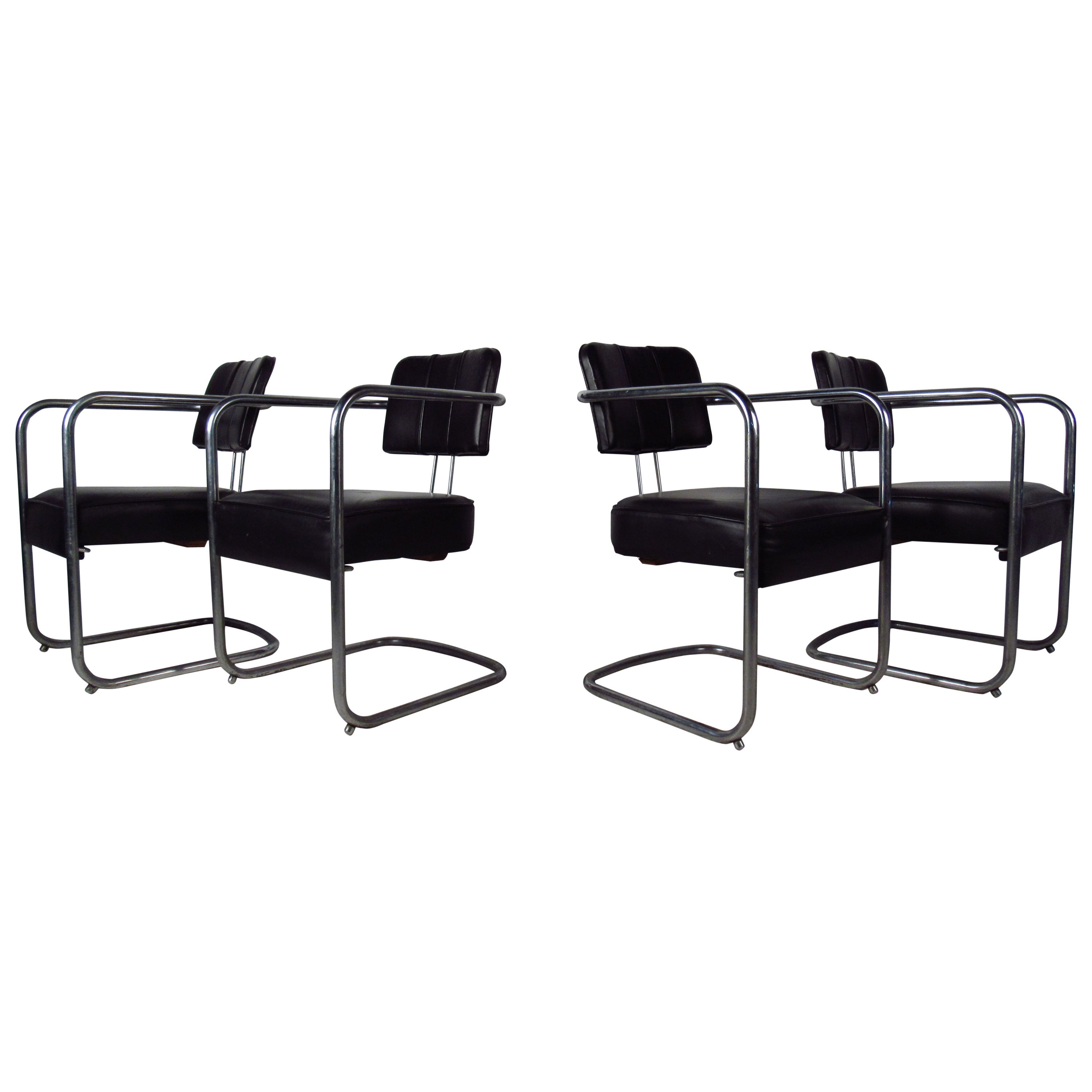 Set of Four Ribbed Black Leather and Chrome Cantilever Dining Chairs at