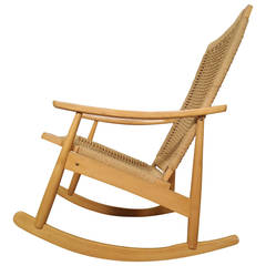 Fauteuil à bascule en corde de style Hans Wegner