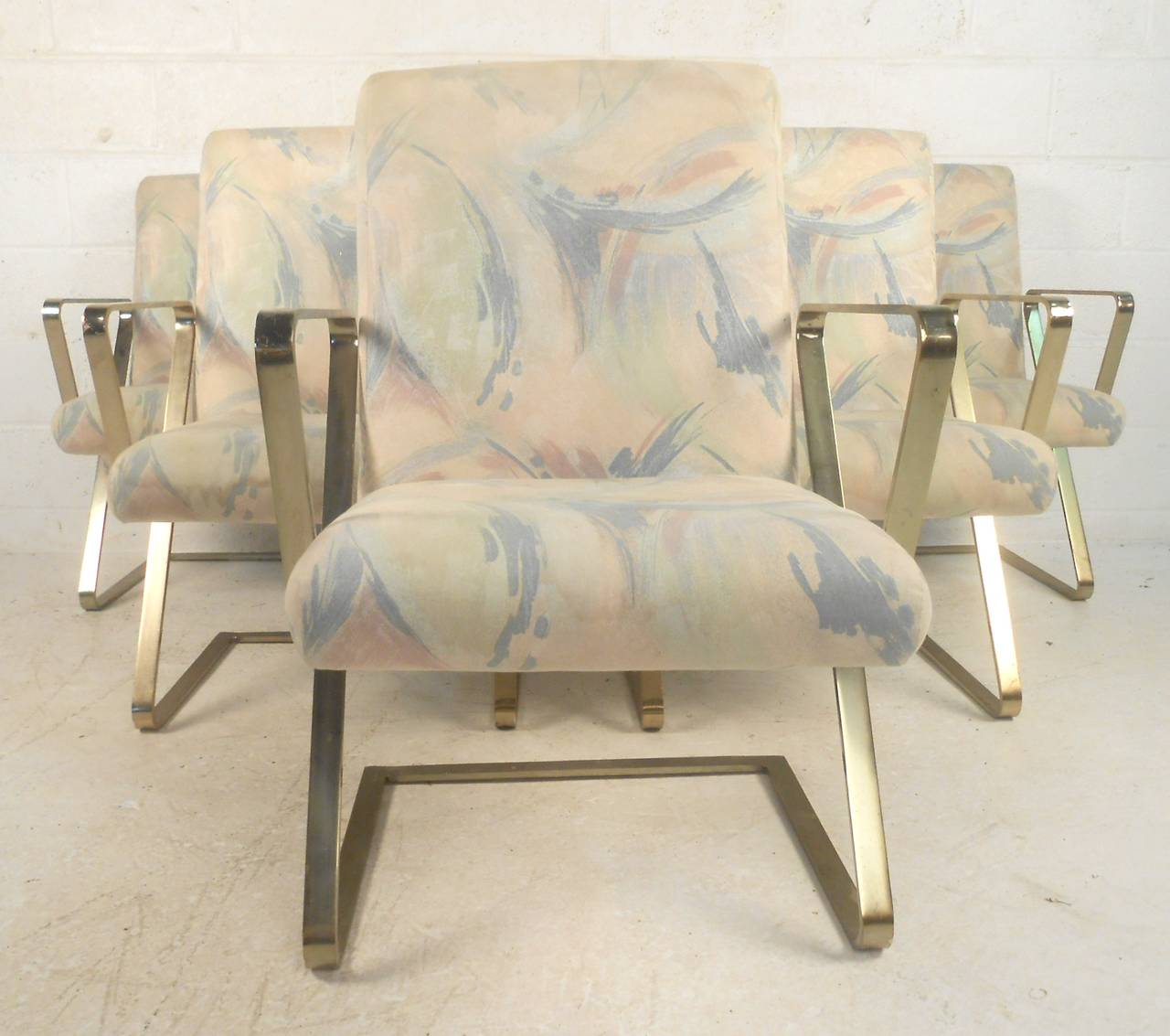 Mid-century modern Milo Buaghman style dining chairs with brass plated Z frames. Cantilever frame gives a floating appearance to the sculpted seat.

(Please confirm item location - NY or NJ - with dealer)