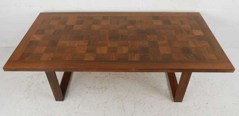 Rosewood parquet coffee table with sled legs by Poul Cadovius makes an impressive cocktail table to home or office seating areas. Unique Scandinavian Modern design combined with quality Mid-Century Modern construction.
Please confirm item location