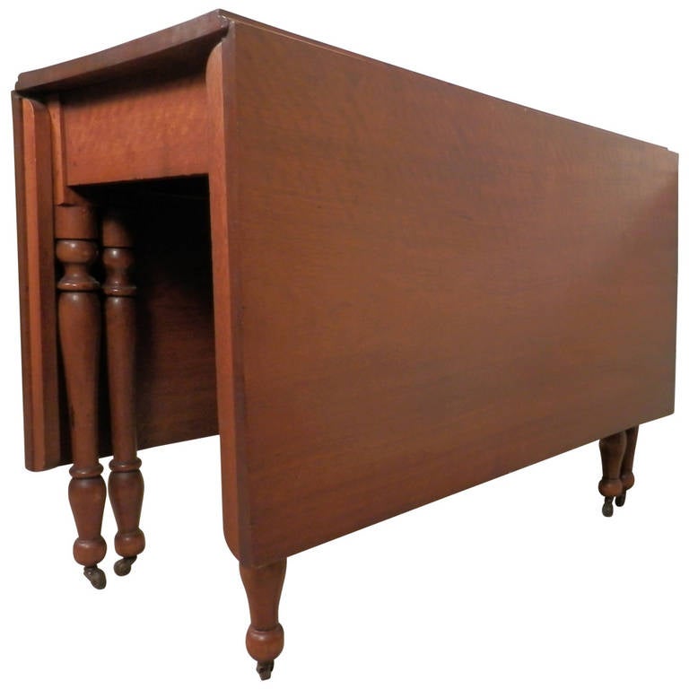 Antique Drop Leaf Table On Casters at 1stDibs