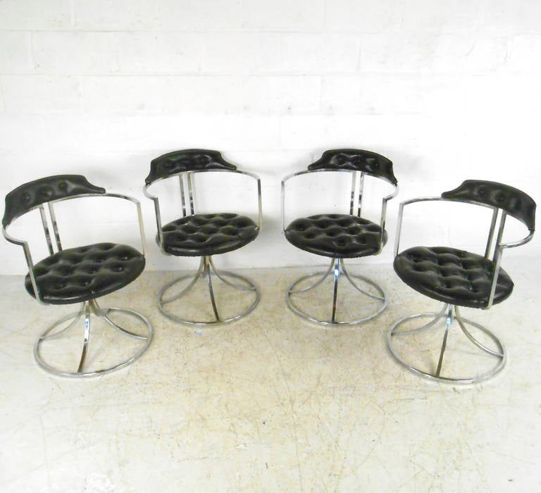 This sturdy matching set of chairs by Daystrom Furniture features classic 1970's style with tufted vinyl and tulip chrome base. Combining comfort and design, this vintage seating solution is perfect for home or business. Please confirm item location