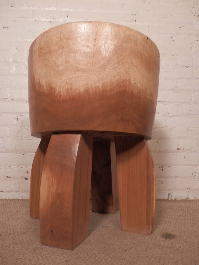 Heavy solid wood stool or side table. Four sculpted legs, butcher block style seat. Perfect long lasting seat for any setting.

(Please confirm item location - NY or NJ - with dealer)