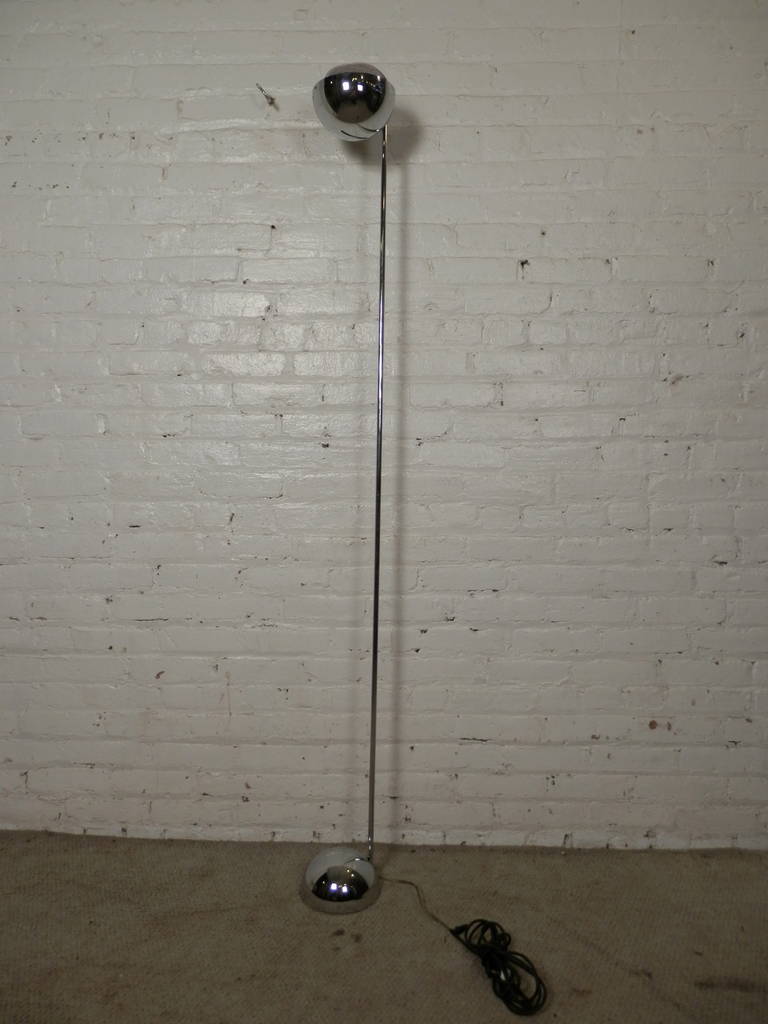 Mid-Century Modern extra tall lamp with weighted bottom, chrome body with metal mesh top. 

(Please confirm item location - NY or NJ - with dealer)