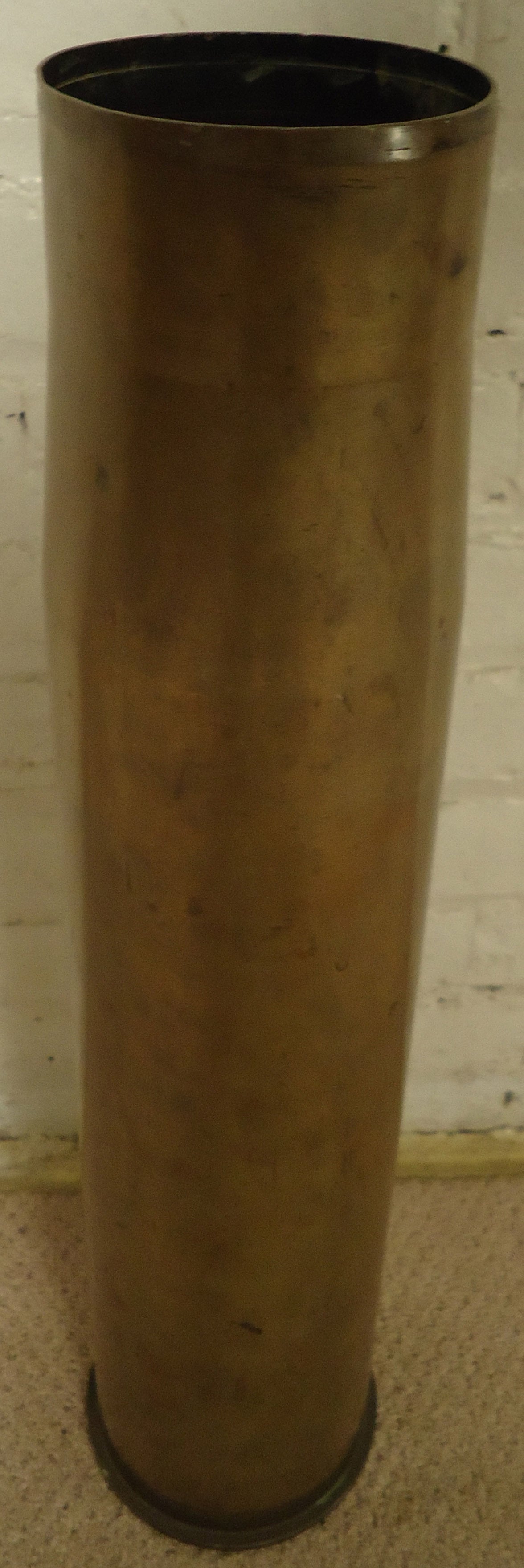 Solid brass bullet casing, perfect as a collectible or for re-purposing as a table lamp.

Please confirm item location NY or NJ with dealer.