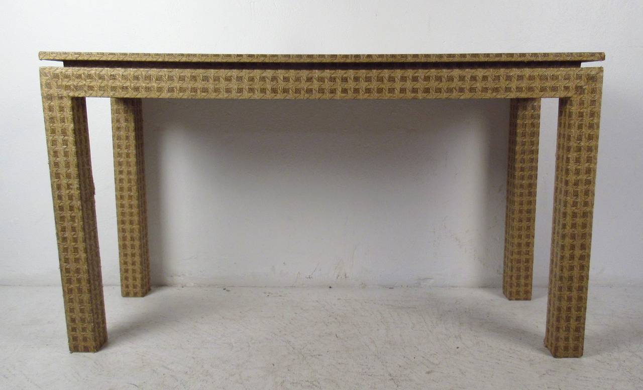 Grass cloth covered console table with patterned design. Great for entryway or sofa back.

(Please confirm item location - NY or NJ - with dealer).