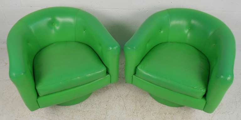Modern Pair of Vintage Lounge Chairs with Swivel Base