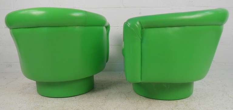 American Pair of Vintage Lounge Chairs with Swivel Base
