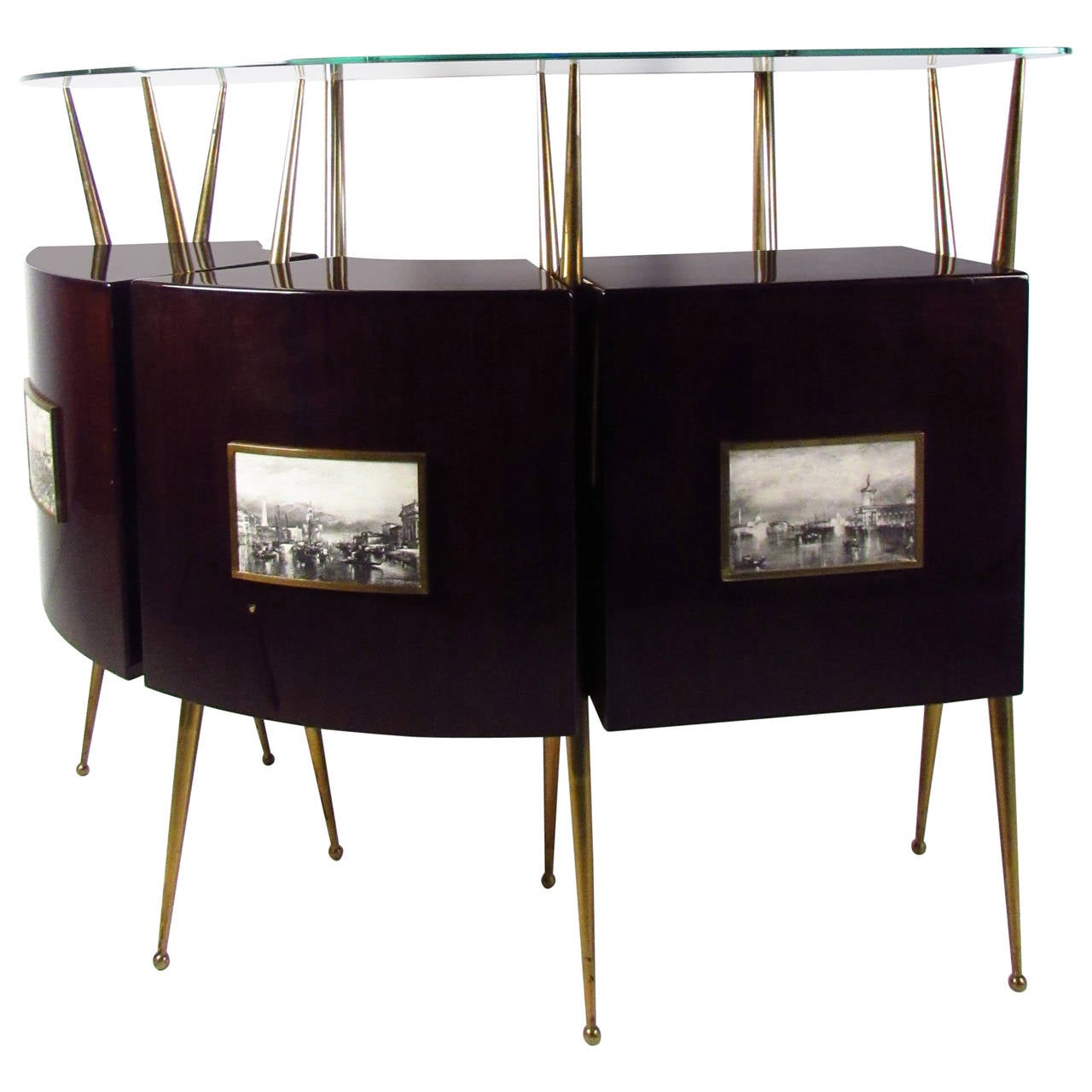 Striking Italian 1950's dry bar in rosewood with glass top and sculpted brass legs. Designed in the style of Gio Ponti. Pair of matching stools included.

Liquor cabinet dimensions - 35W 11D 77H

Please confirm item location NY or NJ with dealer.