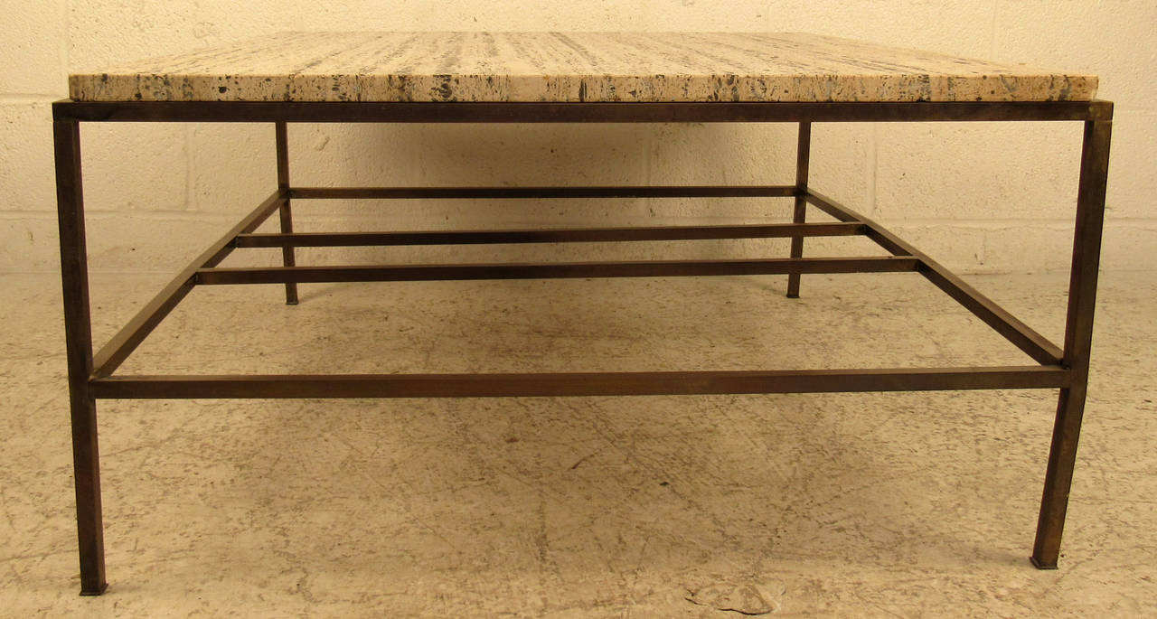 Vintage-modern coffee table featuring brass base and beautiful marble top, designed by Paul McCobb. 

Please confirm item location NY or NJ with dealer.