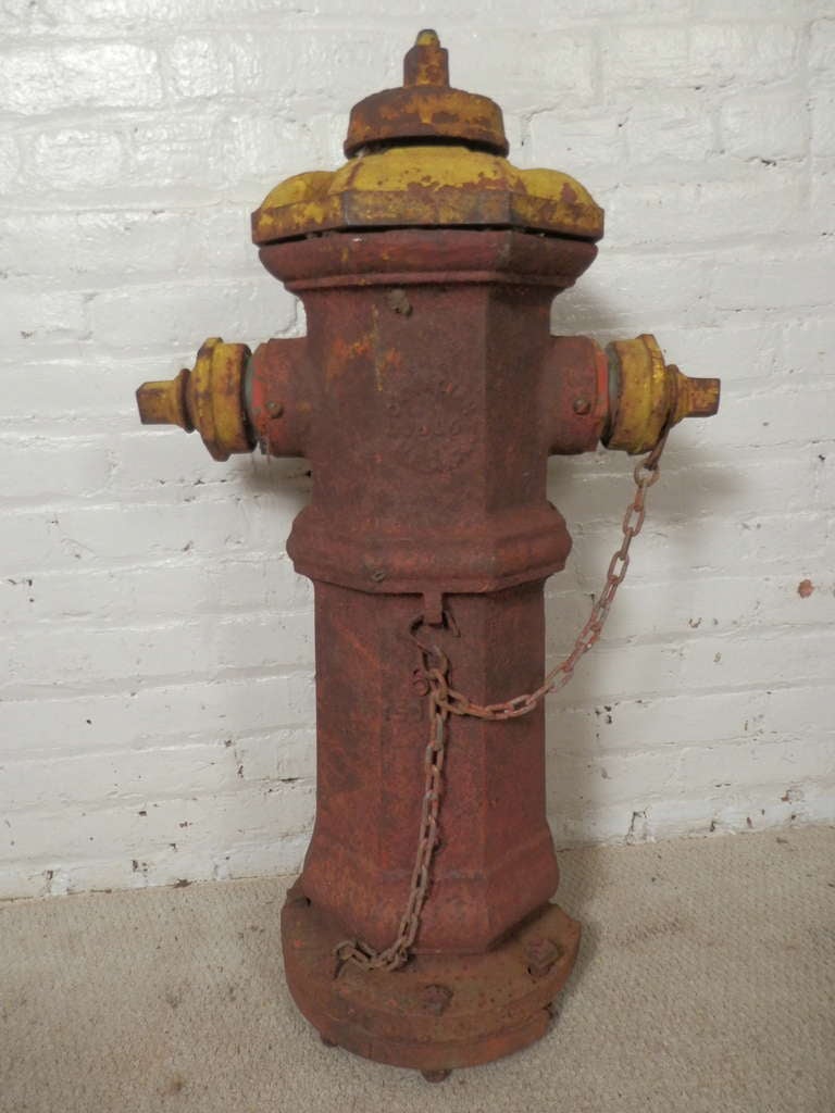 Vintage solid iron hydrant. Faded red and yellow colors, original chain and bolts. Cool indoor/outdoor decoration.

(Please confirm item location - NY or NJ - with dealer)