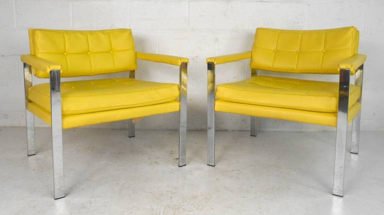 Pair of excellent side chairs in the style of Milo Baughman. With thick chrome frame, tufted seat and back and cushioning on the arm rests. Sold by upscale furniture retailer W&J Sloane.

(Please confirm item location - NY or NJ - with dealer).