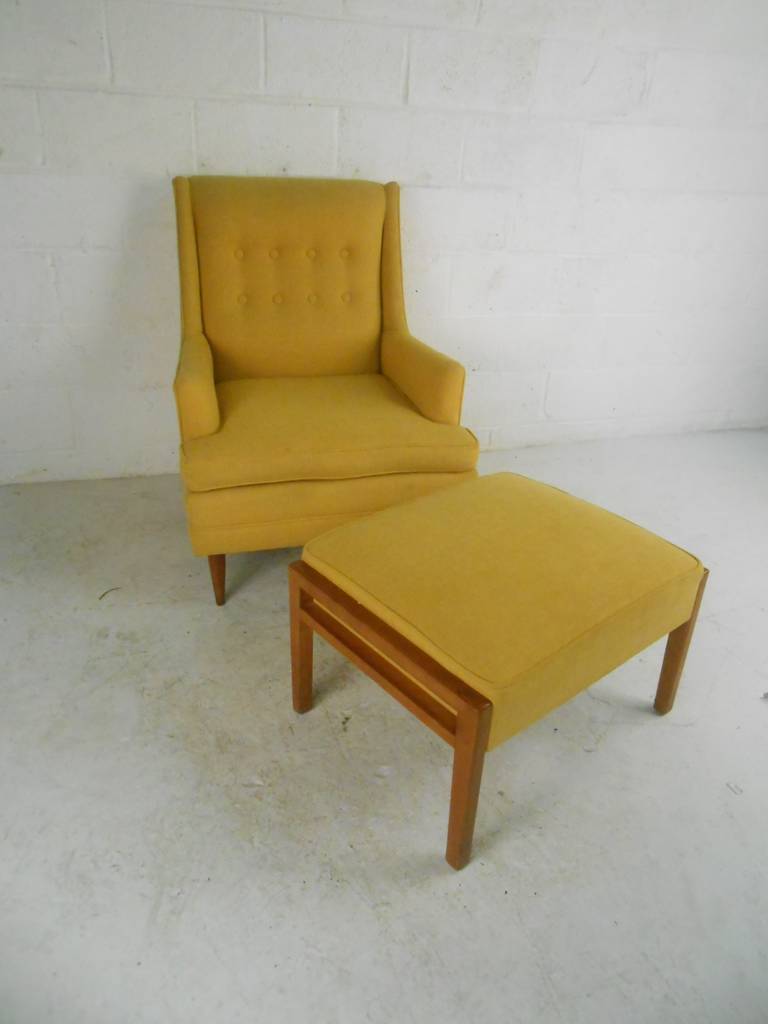 Mid-Century Modern comfortable lounge chair with matching ottoman. Tufted back on chair with tapered legs.

Ottoman dimensions W-25 D-20 H-16

(Please confirm item location - NY or NJ - with dealer)
