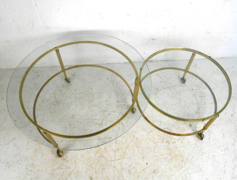 Unique Mid-Century Modern Two-Tier Brass and Glass Pivoting Cocktail Table In Good Condition In Brooklyn, NY