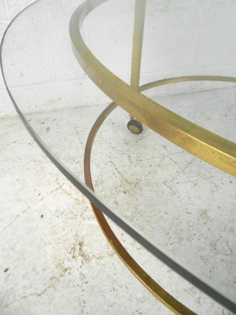 American Unique Mid-Century Modern Two-Tier Brass and Glass Pivoting Cocktail Table
