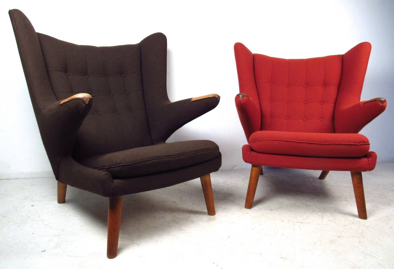 This rare pair of iconic vintage-modern Papa Bear chairs with original upholstery, widely celebrated design (AP19) by AP Stolen dates back to the 1950s. Contact for further details on purchasing as a pair or separately.

Please confirm item