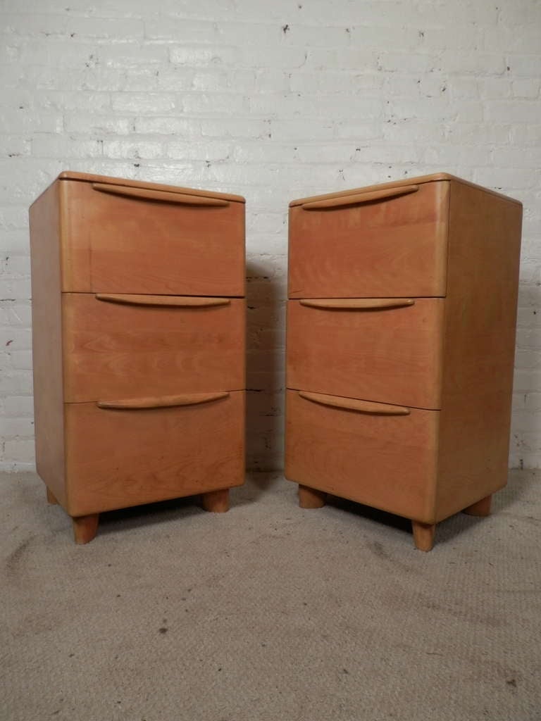 Pair of vintage modern three drawer nightstands by Heywood Wakefield. A J.B. Van Sciver Co tag is still inside showing where it was sold. Gorgeous smooth lines in a golden 