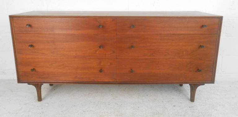 Eight drawer double dresser in walnut attributed to Milo Baughman for Glenn of California. Please confirm item location (NY or NJ) with dealer.