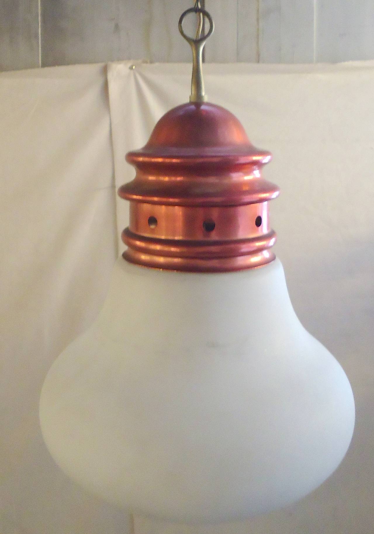 Hanging pendant with frosted white globe and red metal trim.

(Please confirm item location - NY or NJ - with dealer)
