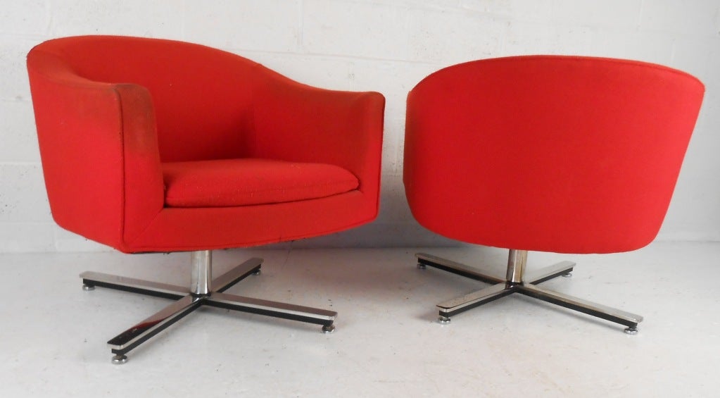 Great pair of barrel back club chairs on chrome swivel bases. These chairs are very sturdy and well built weighing in at 105 lbs. each