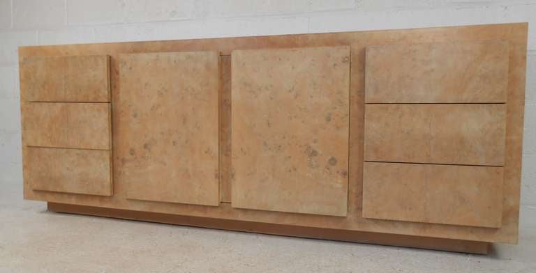Burl wood credenza with multiple storage options. Please confirm item location (NY or NJ) with dealer.