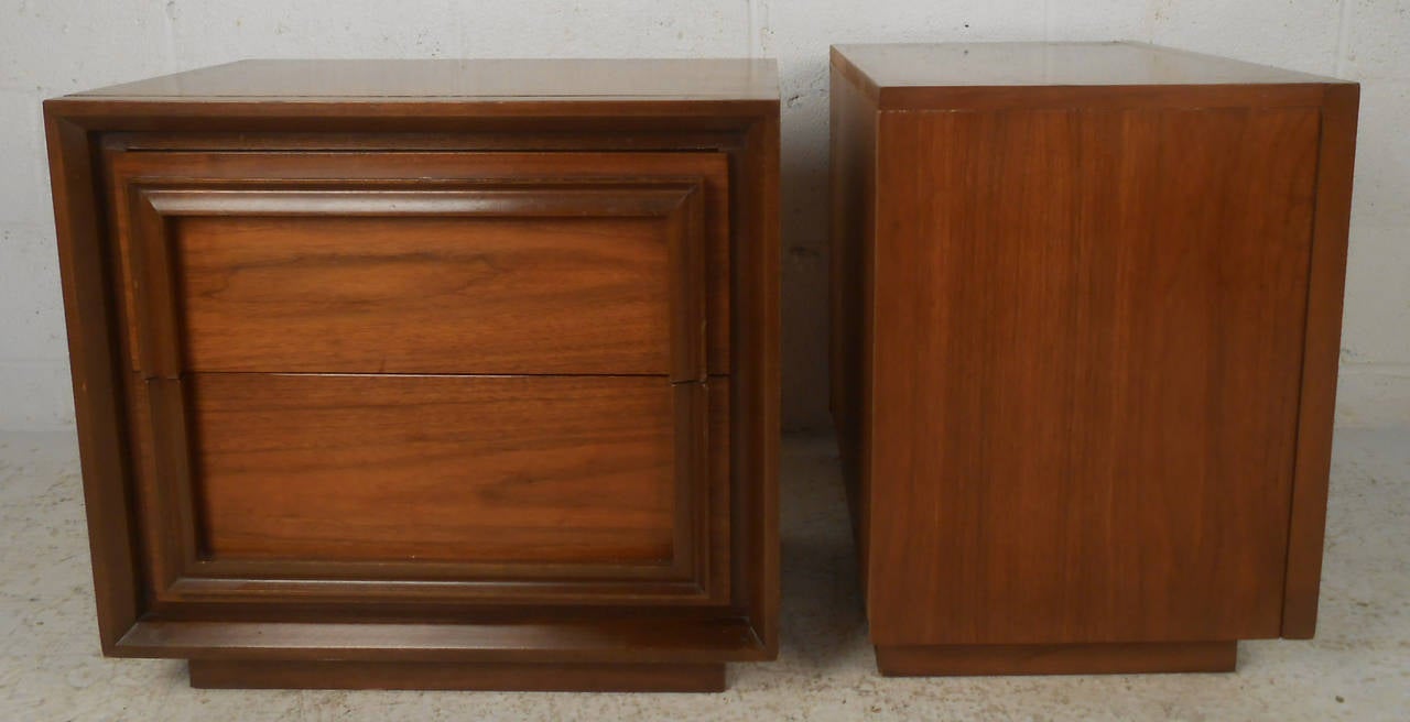 Two vintage-modern side tables, features walnut grain, two drawers and sculpted trim, manufactured by J.B. Van Sciver.

Please confirm item location NY or NJ with dealer.