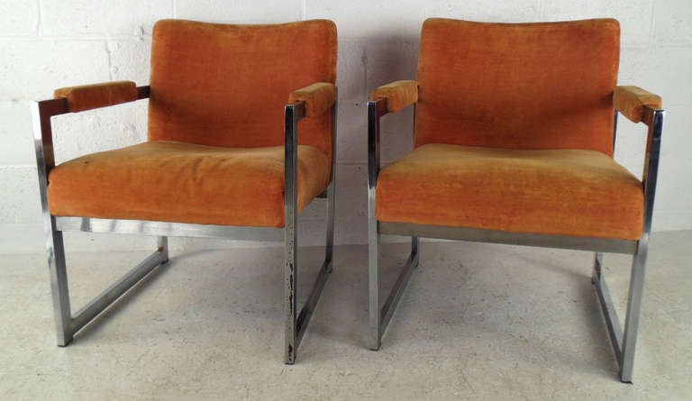 These unique Baughman style armchairs are in need of re-upholstery and restoration work. Featuring metal frames, and upholstered armrest, these make a comfortable midcentury addition to home or business. Please confirm item location (NY or NJ).