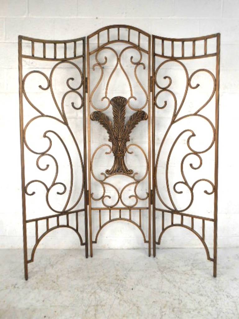 This sculpted contemporary decorator's screen is a fantastic addition to the decor of any home design. With sturdy construction and painted finish on both sides, this piece makes a great room divider and a unique way to dress up a room. Please