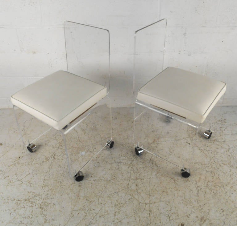 Pair Mid-Century Modern Lucite Rolling Chairs