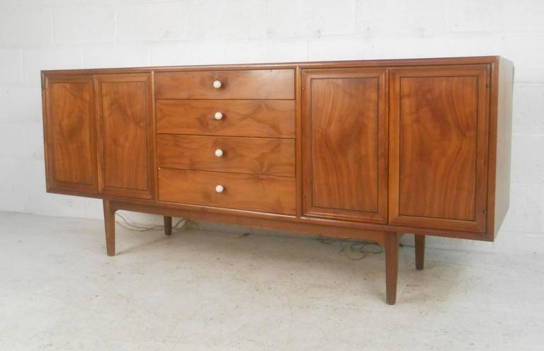 Drexel "Declaration" server featuring four dovetailed drawers with ceramic pulls and cabinet doors on each side with adjustable shelves. Please confirm item location (NY or NJ) with dealer.