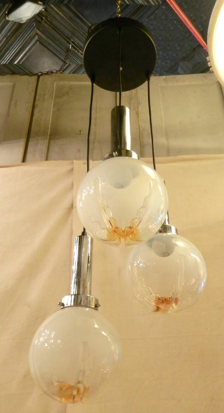 Vintage three globe pendant by Italian glass lamp maker AV Mazzega. Hand made 