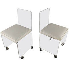 Pair Mid-Century Modern Lucite Rolling Chairs