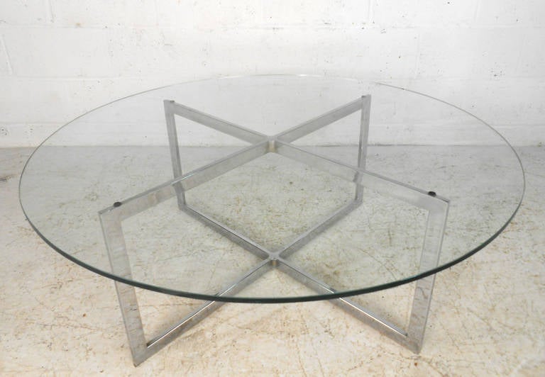This simple yet stylish vintage chrome and glass coffee table makes a wonderful addition to home or business. Sturdy chrome X style table base make this a classic mid-century center table for any room. Please confirm item location (NY or NJ).