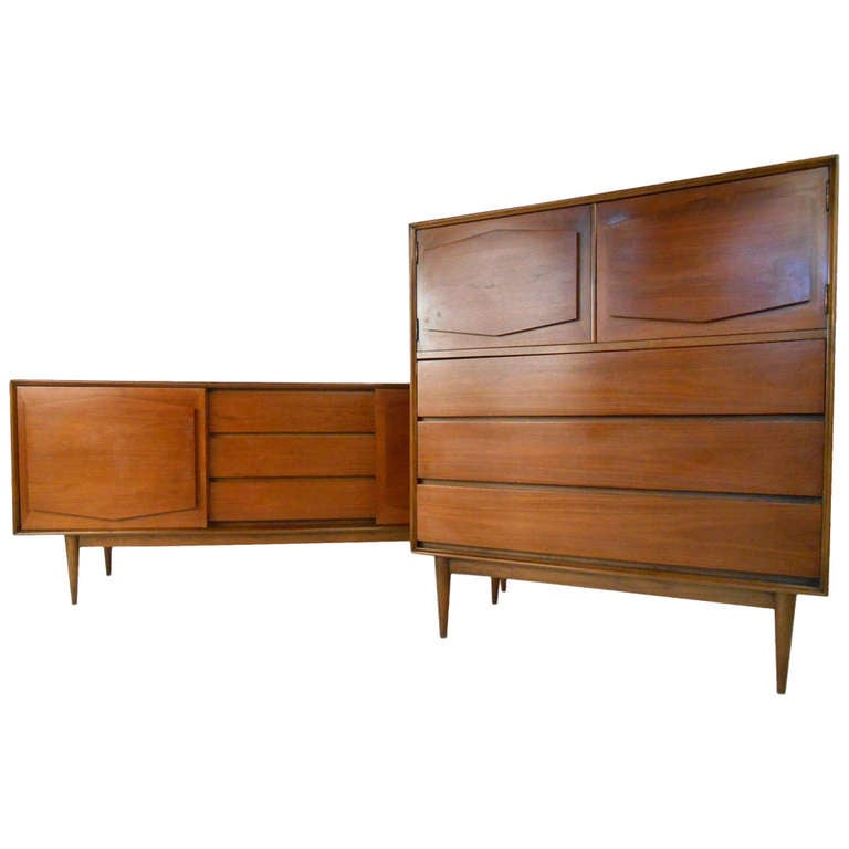 Unique Mid-Century walnut highboy dresser by R-Way makes a stylish storage piece in any setting. Tapered legs and cabinet style top add to its simple yet stylish Mid-Century appeal. Please confirm item location (NY or NJ) with dealer.