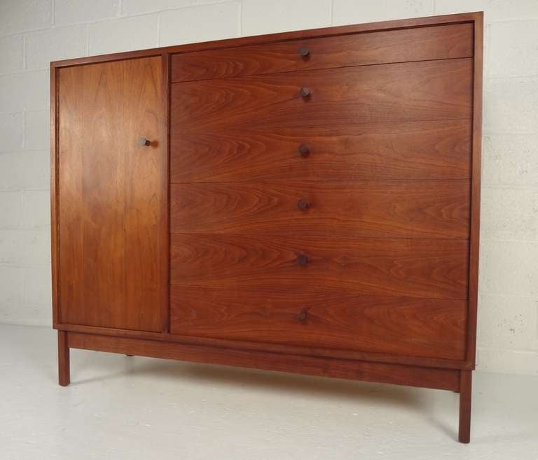 Tall chest of six drawers and one door in walnut. Please confirm item location (NY or NJ) with dealer.