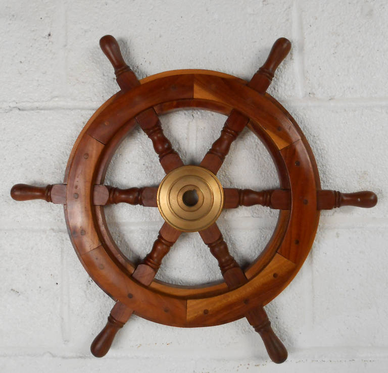 This unique vintage ship wheel features lovely design details and makes a wonderful addition to any nautical decor. Rustic feel but fantastic condition, this unique ship's wheel is ready for use in any decor application. Please confirm item location