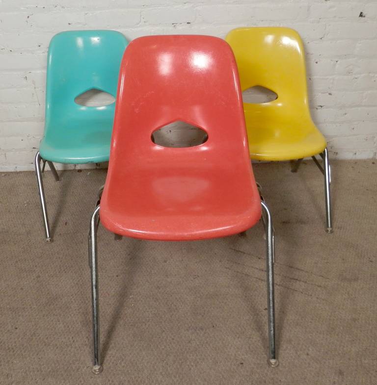 Fiberglass shells on heavy duty steel frames. Easily stack-able and in fun colors. Molded fiberglass 