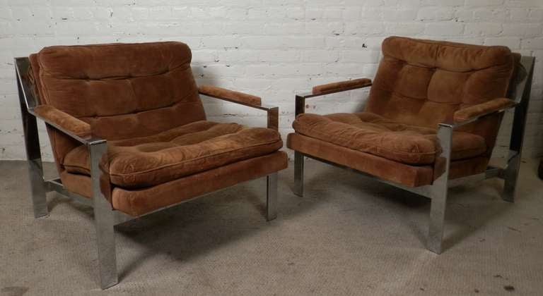 Pair of mid-century modern chrome frame arm chairs by Cy Mann.  Great angular form with tufted seating.

(Please confirm item location - NY or NJ - with dealer)