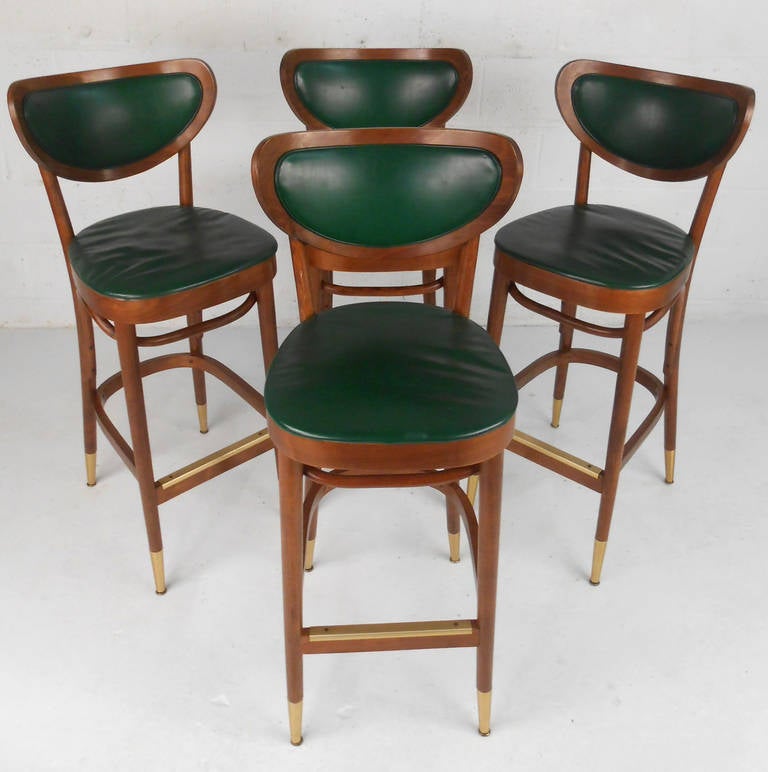 Set of Mid-Century Modern Walnut And Vinyl Barstools