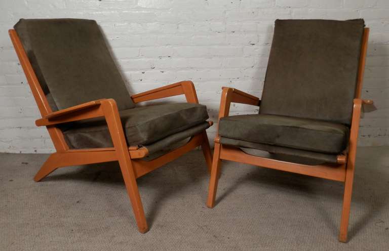 Mid-century modern maple chair with fresh green fur like upholstery designed by Pierre Gauriche. Sleek modern lines, cow skin like fabric, soft cushy seating.

(Please confirm item location - NY or NJ - with dealer)