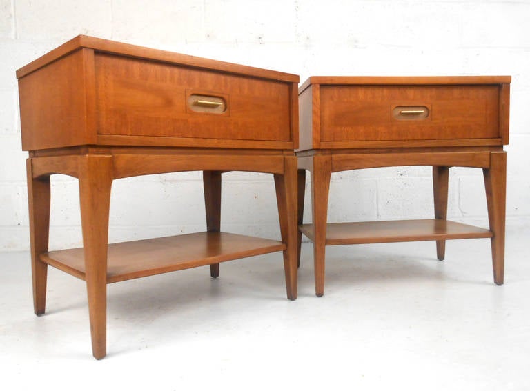 This pair of single drawer Avodire & Pecan end tables work well in any setting, whether as sofa end tables or bedroom nightstands. Unique mid-century drawer pulls, tapered legs, and secondary shelf for display make these a wonderful addition to any