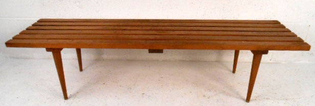 This George Nelson style coffee table/bench is sturdily constructed, and a great fit for any home or office.